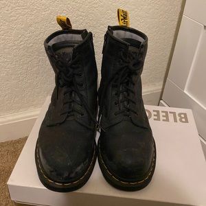 Doc Marten steal toe boots.